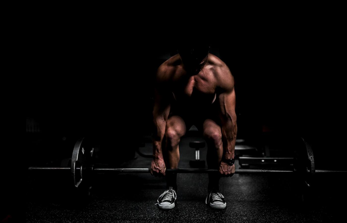 Žena cvičící ve fitness centru